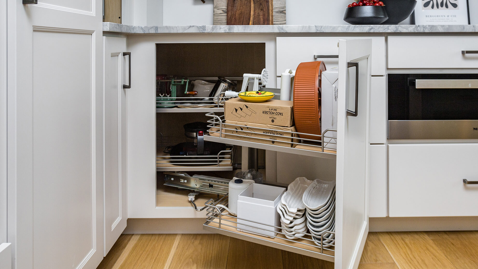 Dura Supreme Swing-out basket storage for corner cabinets.