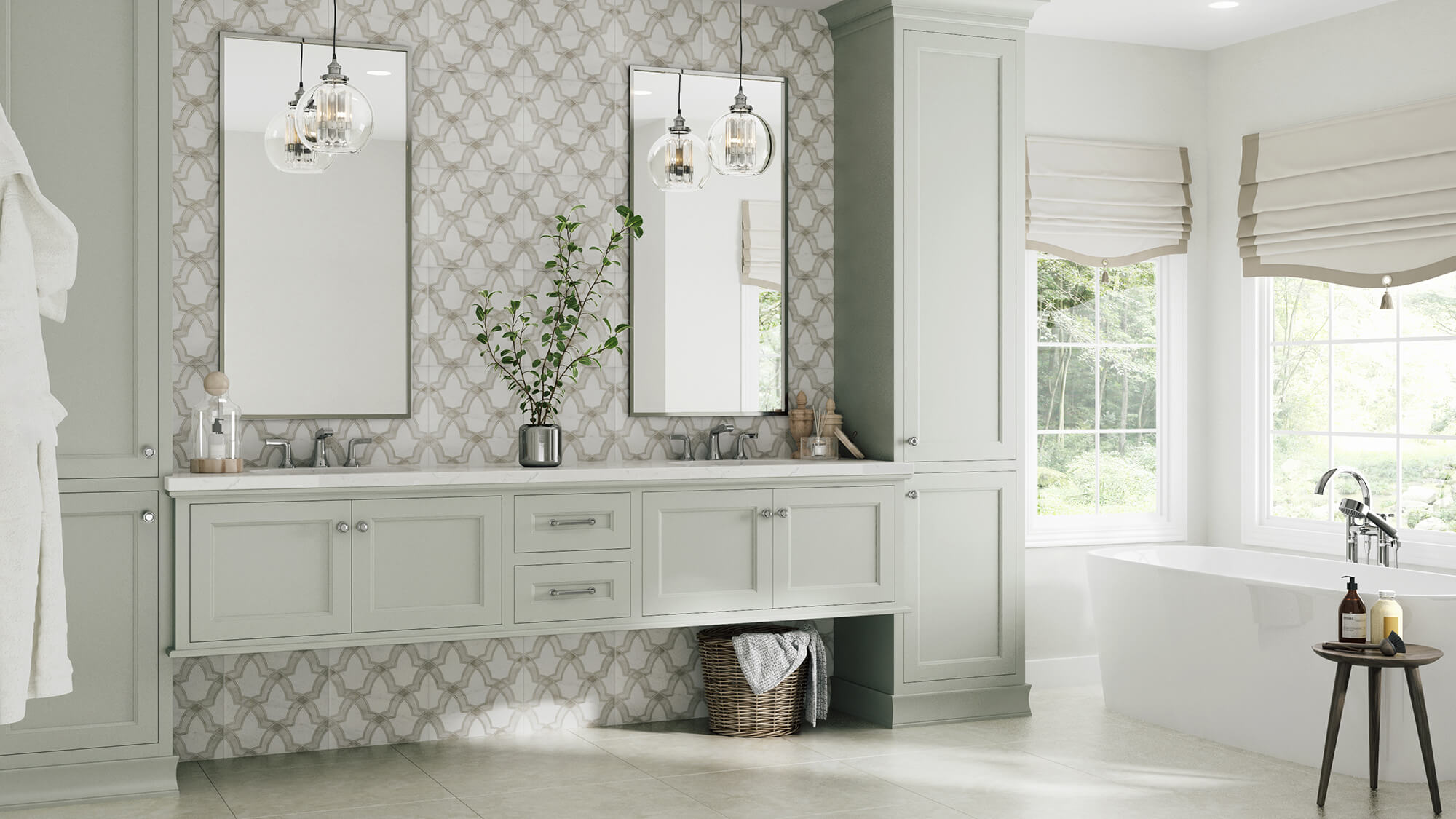 A transitional style master bathroom with a white and light gray color palette. A floating vanity in a soft gray painted finish is framed by two tall linen cabinets that stretch from the floor to the ceiling along with the floor-to-ceiling backsplash tiles. The cabinets feature a custom Personal Paint Match to Sherwin-Williams Silver Strand paint color.