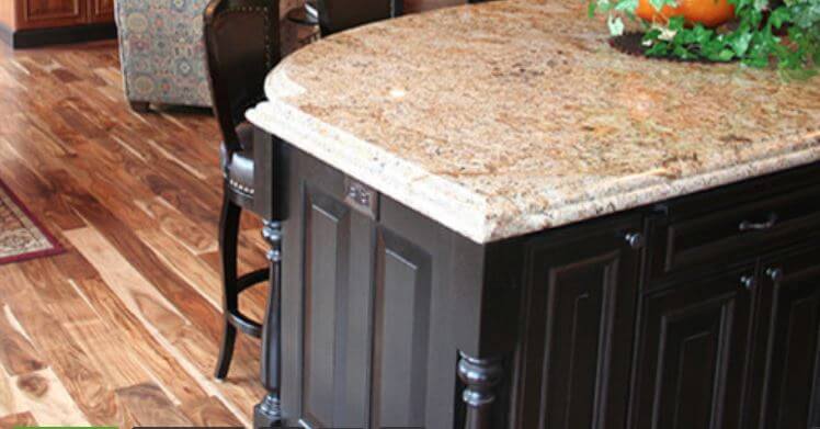 Dura Supreme Cabinetry, design by The Cabinet Shoppe in Minneapolis, wood stained outlet face plate to match