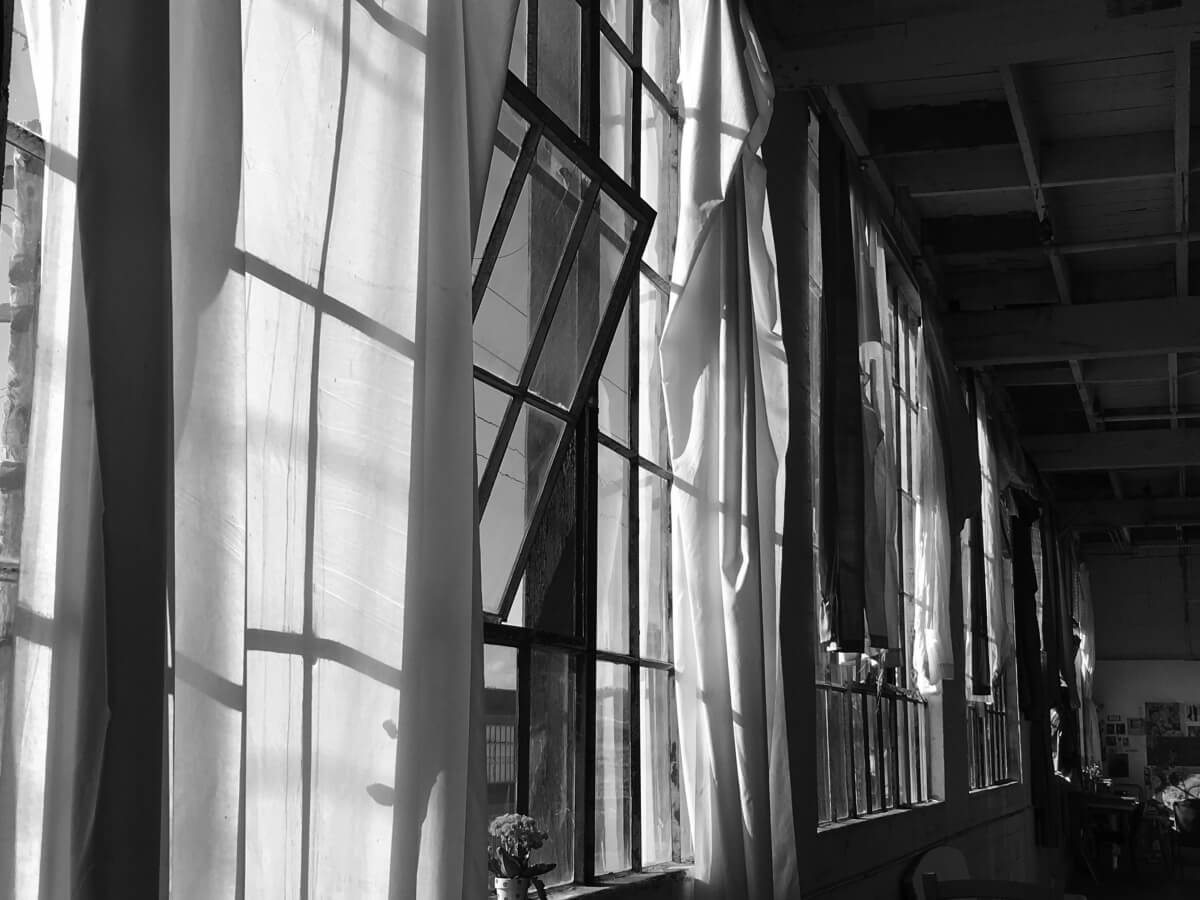 Urban Loft interior design history. An old 1800's artstudio loft in Paris, France where an old factory was transformed into an art studio and functioning apartment living space.