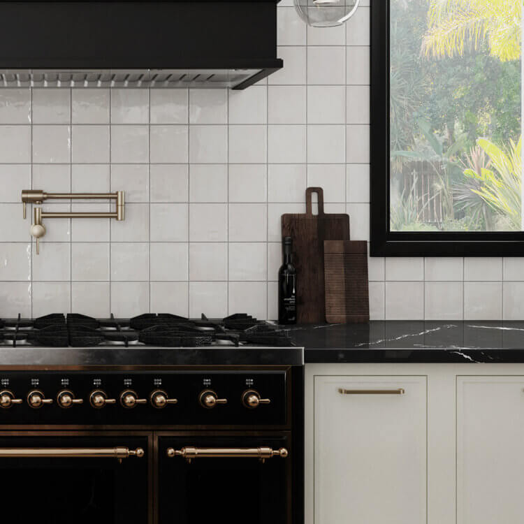 Kitchen appliance landing counterspace next to a stovetop and oven.