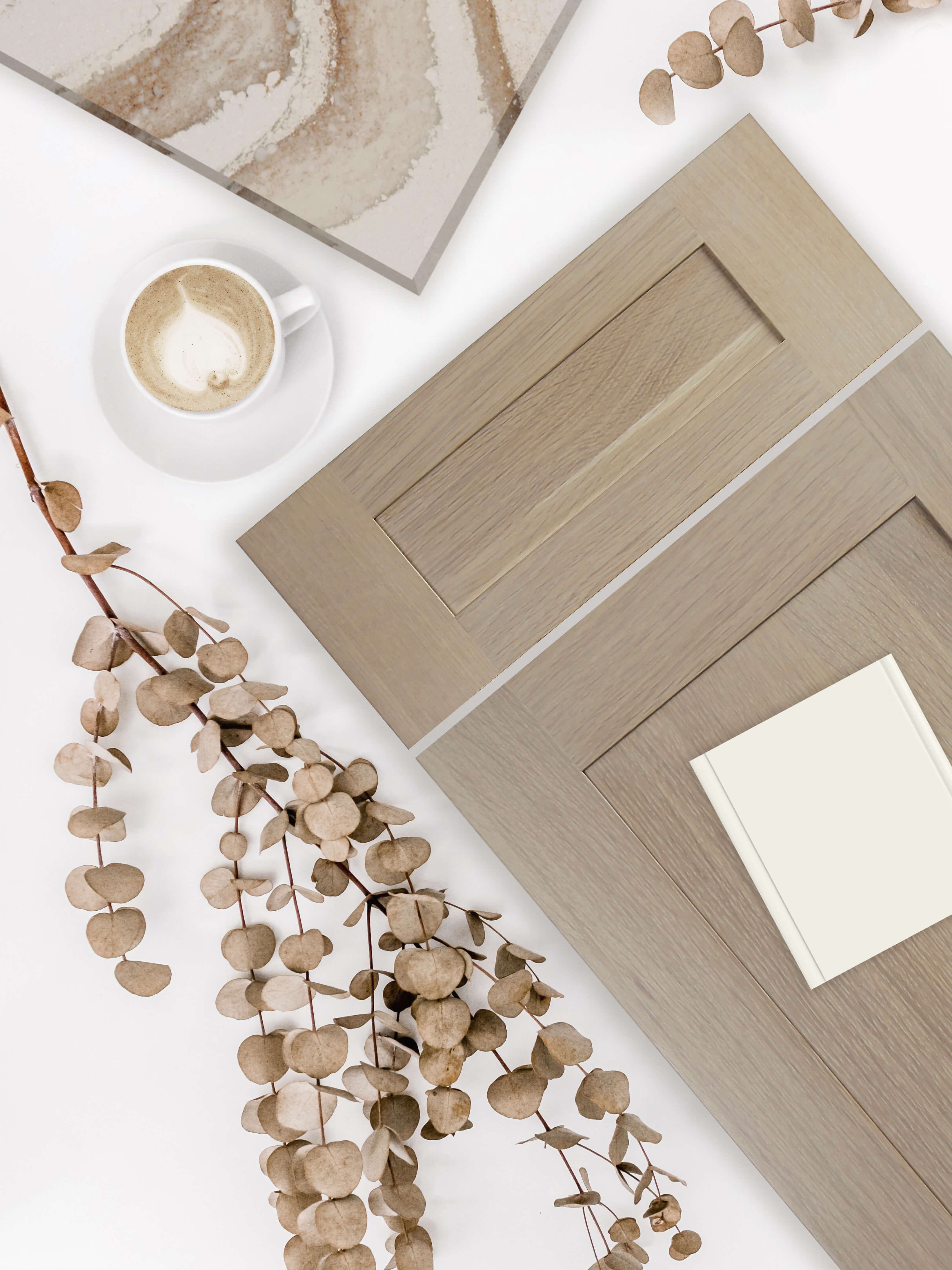 Soft brown hues and wood textures for cabinetry inspired by natural elements.