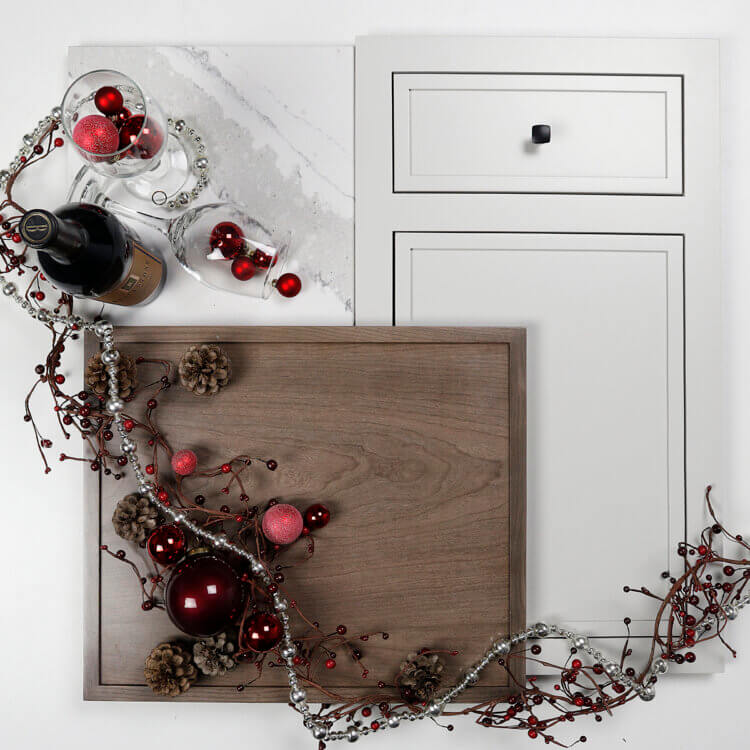 A chirstmas kitchen design idea for remodeling showing a stained and a painted door style.