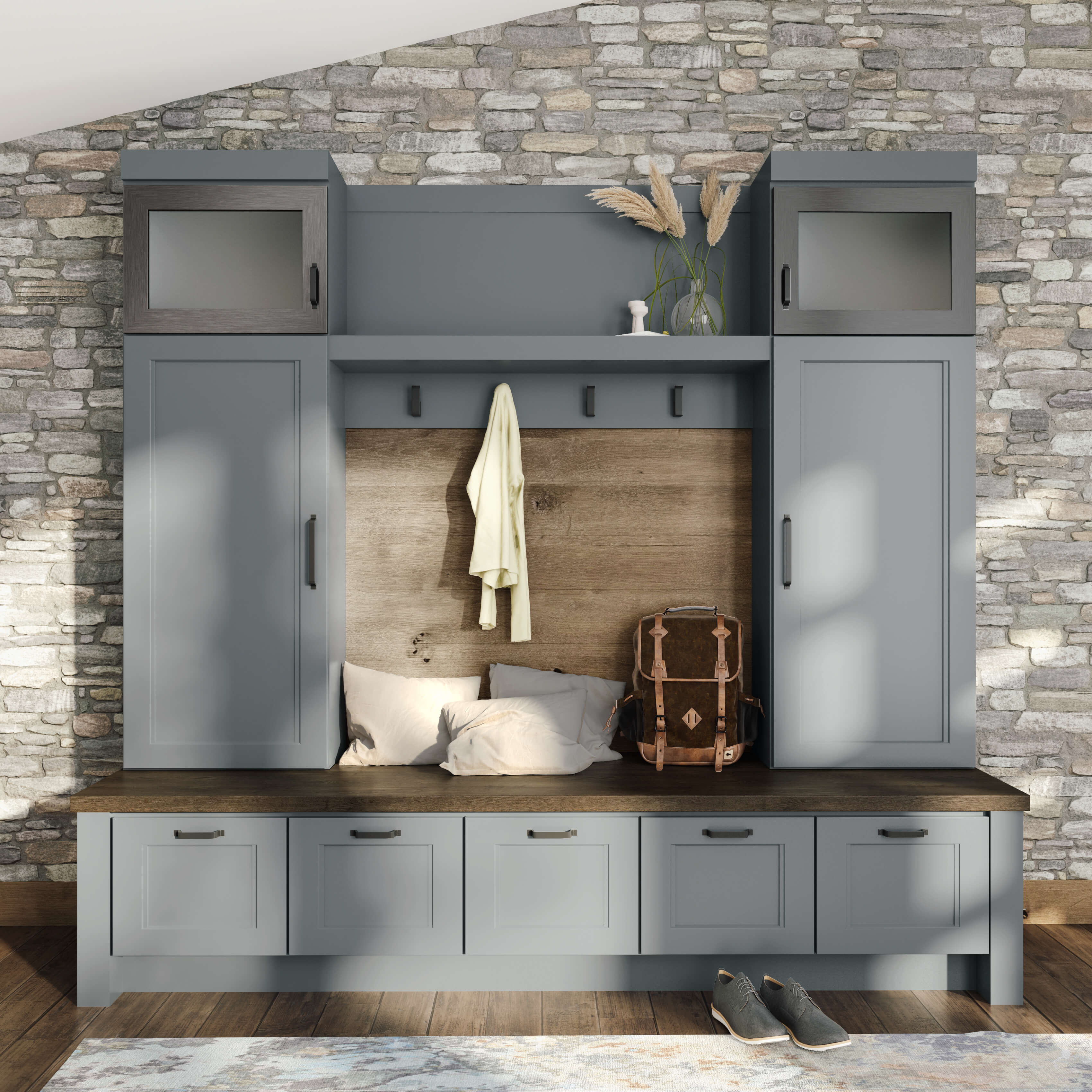 An organized entryway boot bench with mudroom lockers and coat hooks.