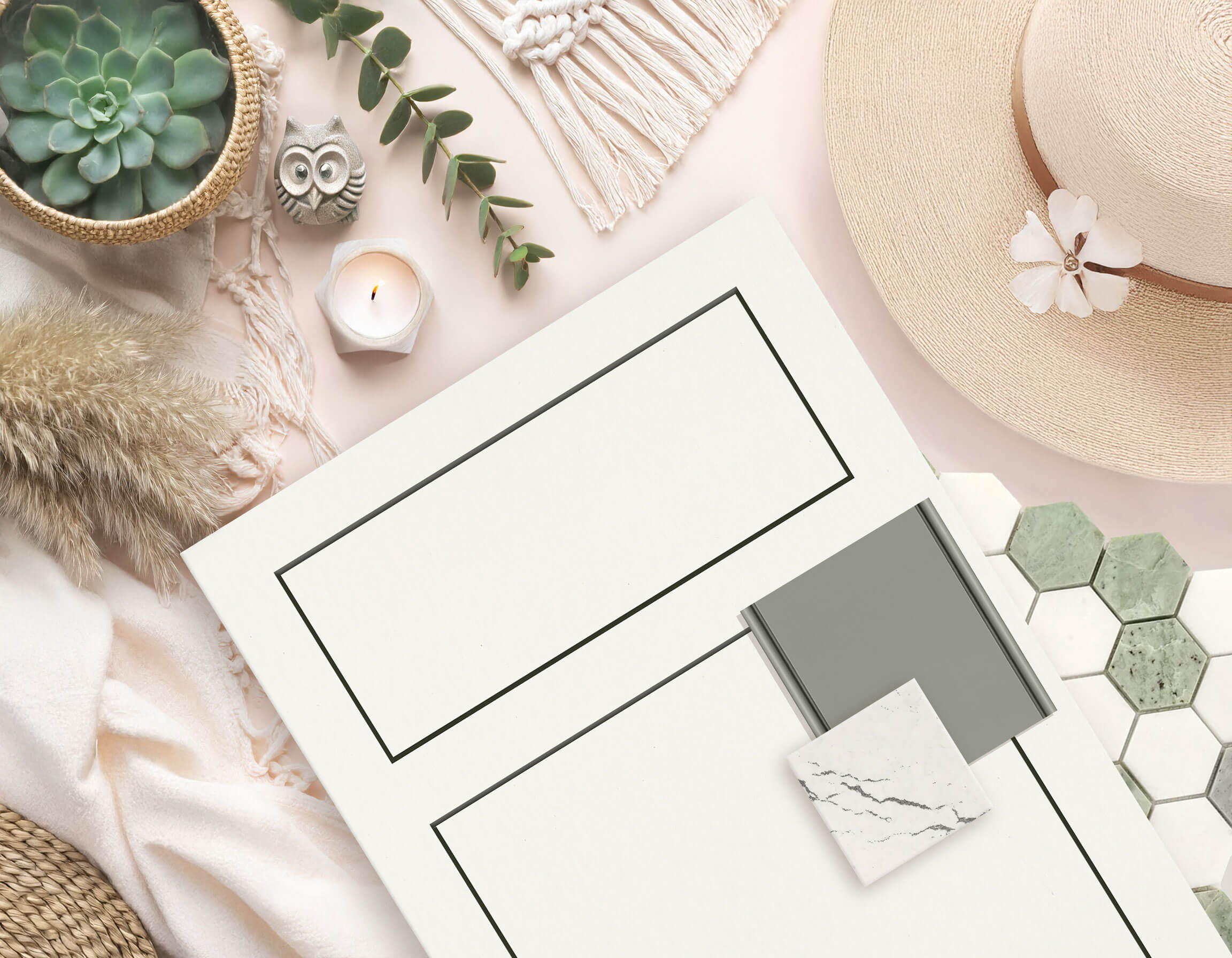 A Bohemian styled flat lay for a kitchen design idea with a slab inset cabinet door in white paint paired with a green paint color.