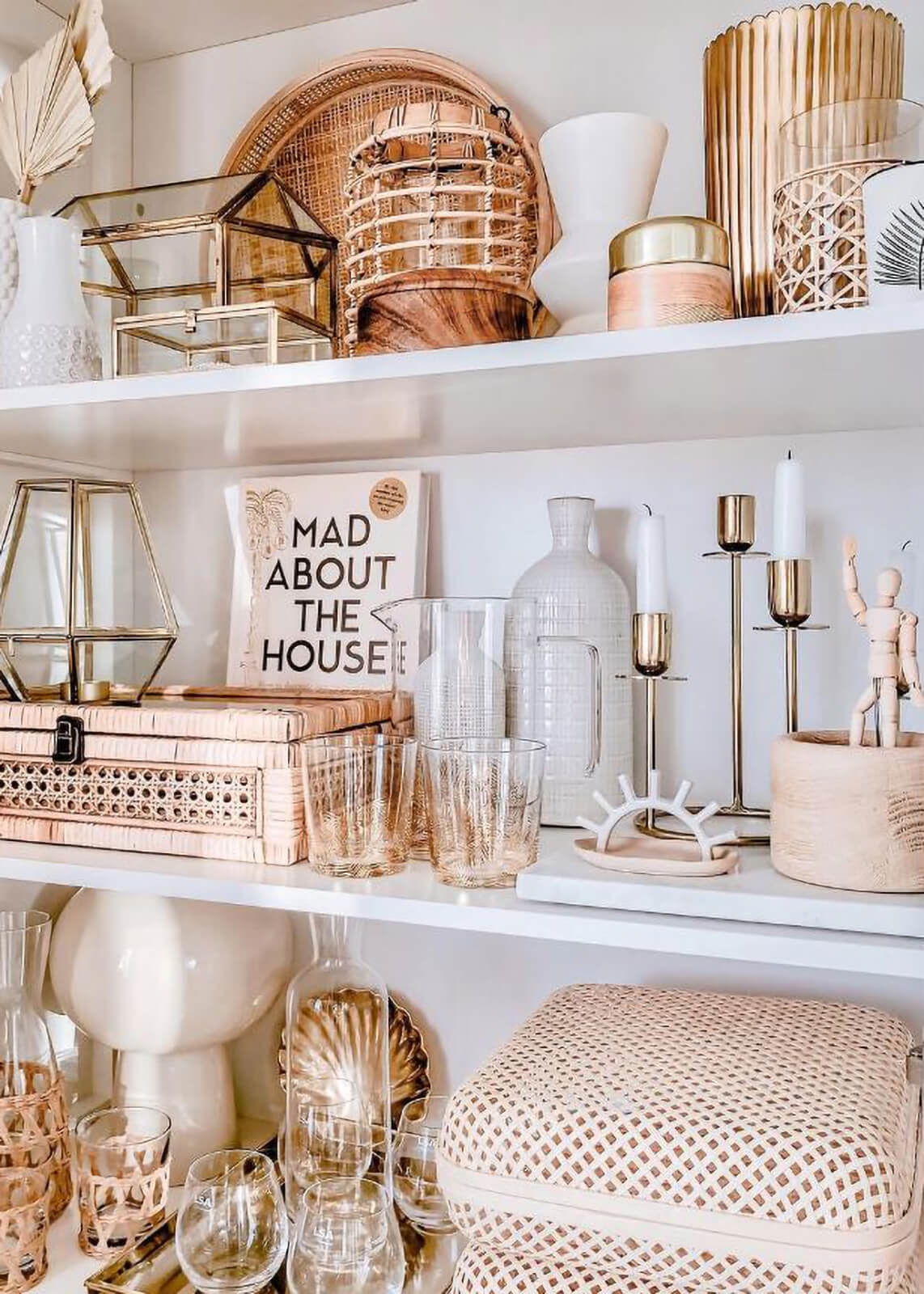 Open shelves with an eclectic collection of Boho styled decor.