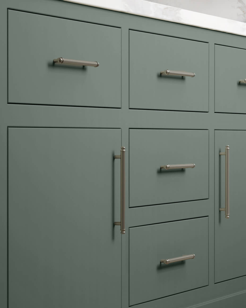 A Bohemian kitchen with vibrant green painted cabinets with simplistic slab inset doors.