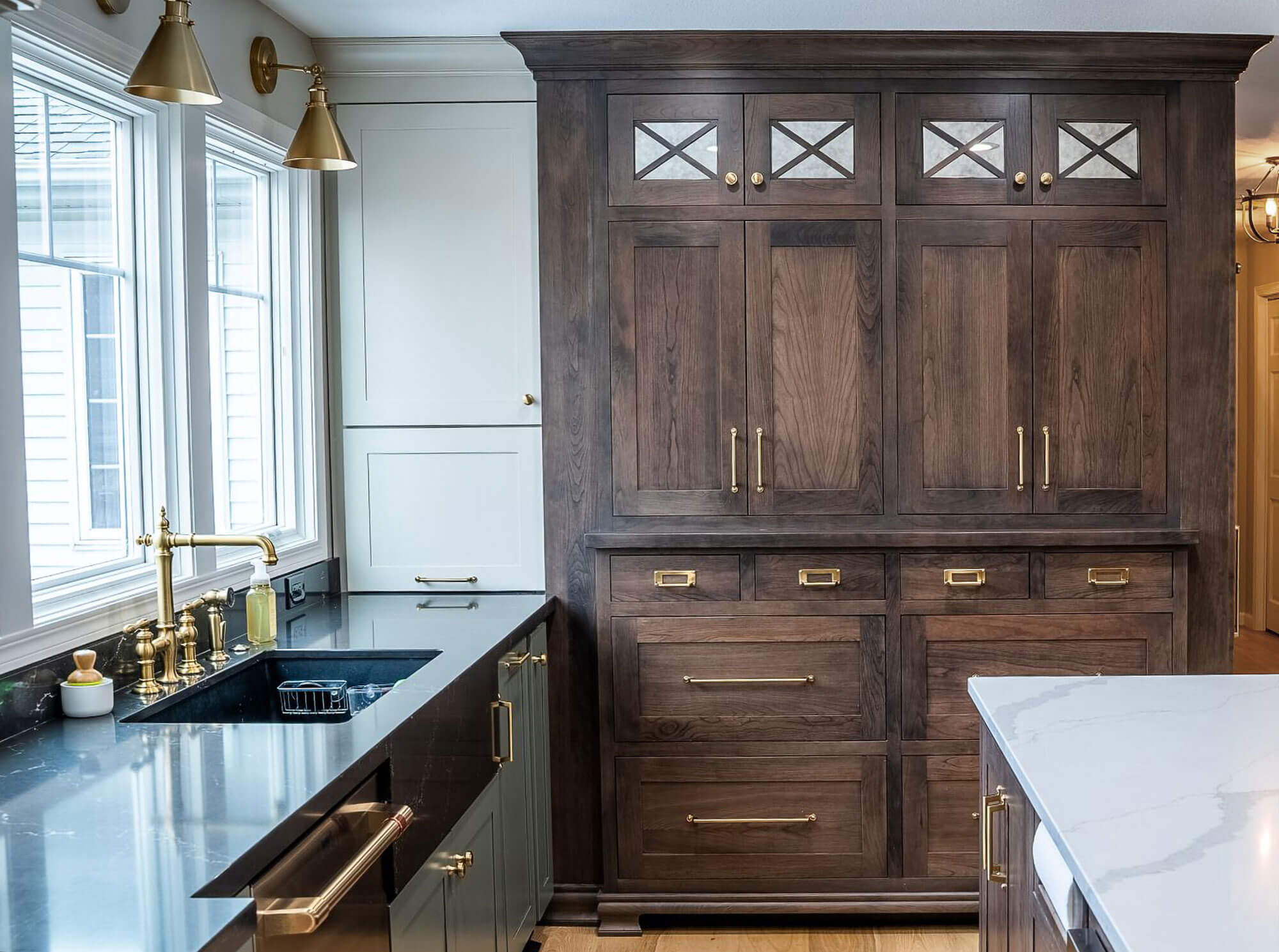 A custom hutch looking space created to accent a special part of the kitchen design.