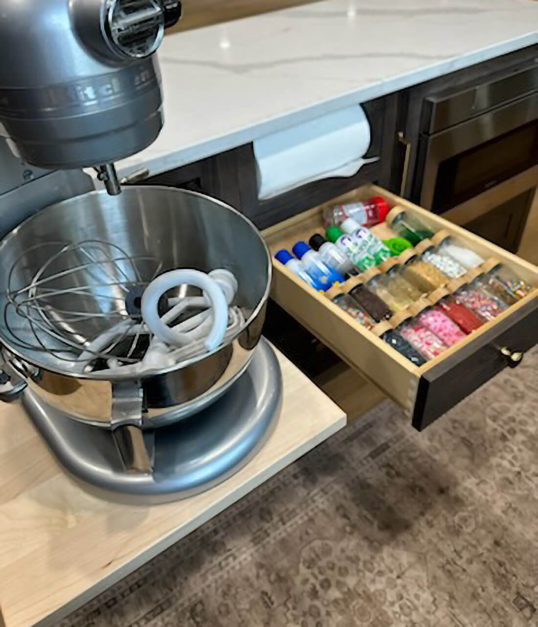 Keeping spices close at hand can make the task at hand so much easier. Utilizing a slanted drawer organizer for sprinkles and spices is a great idea.