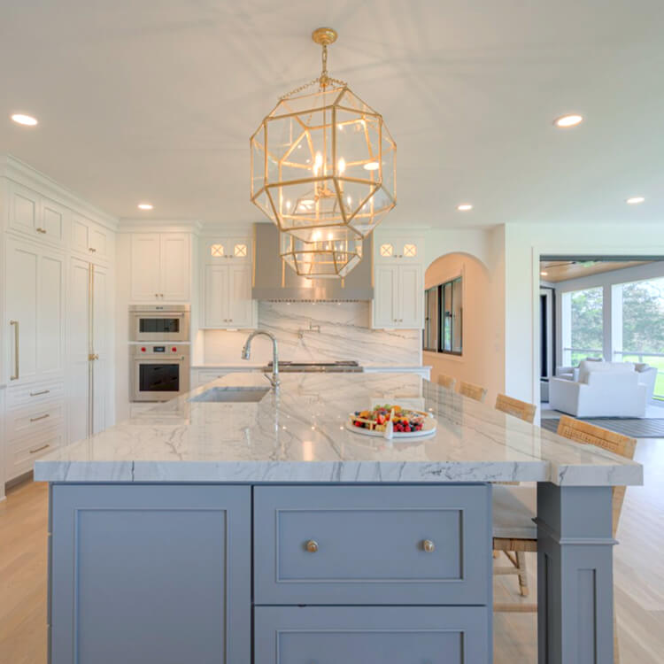 A view of the end of the kitchen island looking into the new kitchen design.