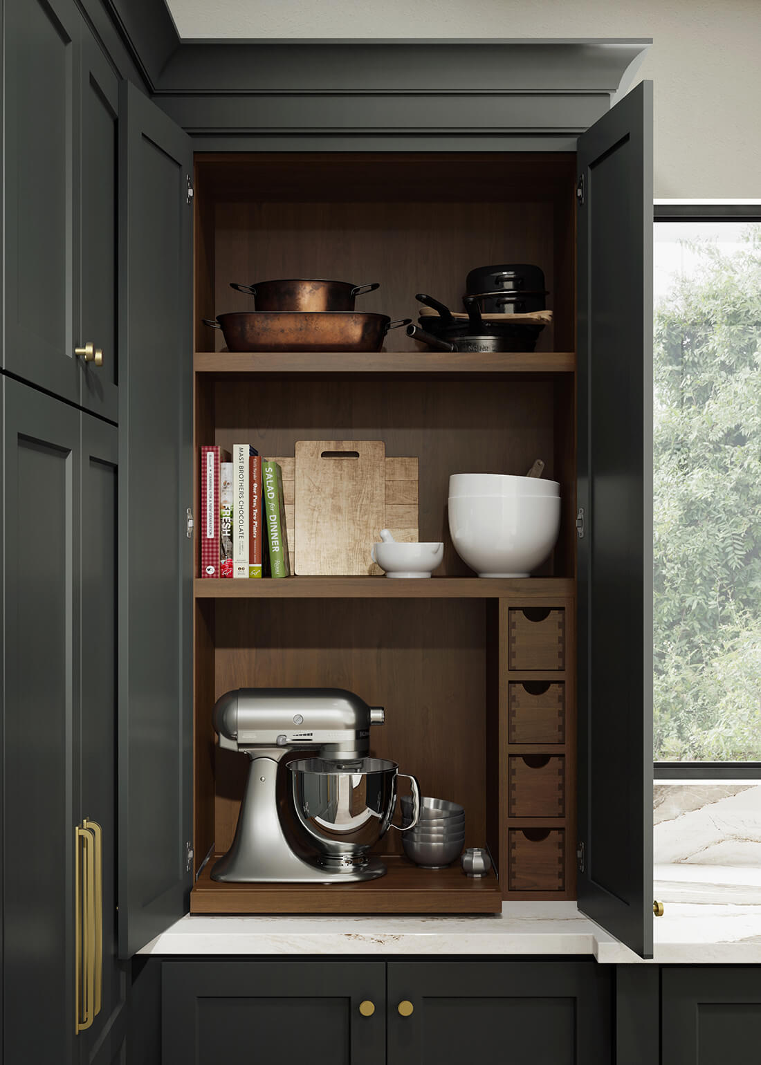 Dura Supreme's Baking Center Larder Cabinets offer thoughtfully planned shelves and cubbies provide dedicated space for an assortment of baking gadgets, pantry goods, and measuring cups, keeping them easy to find and at your fingertips.
